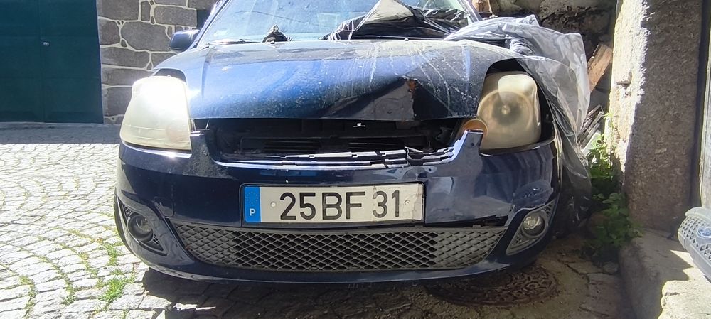 Vendo  pela melhor oferta ou troco Ford fiesta 2006 por mota