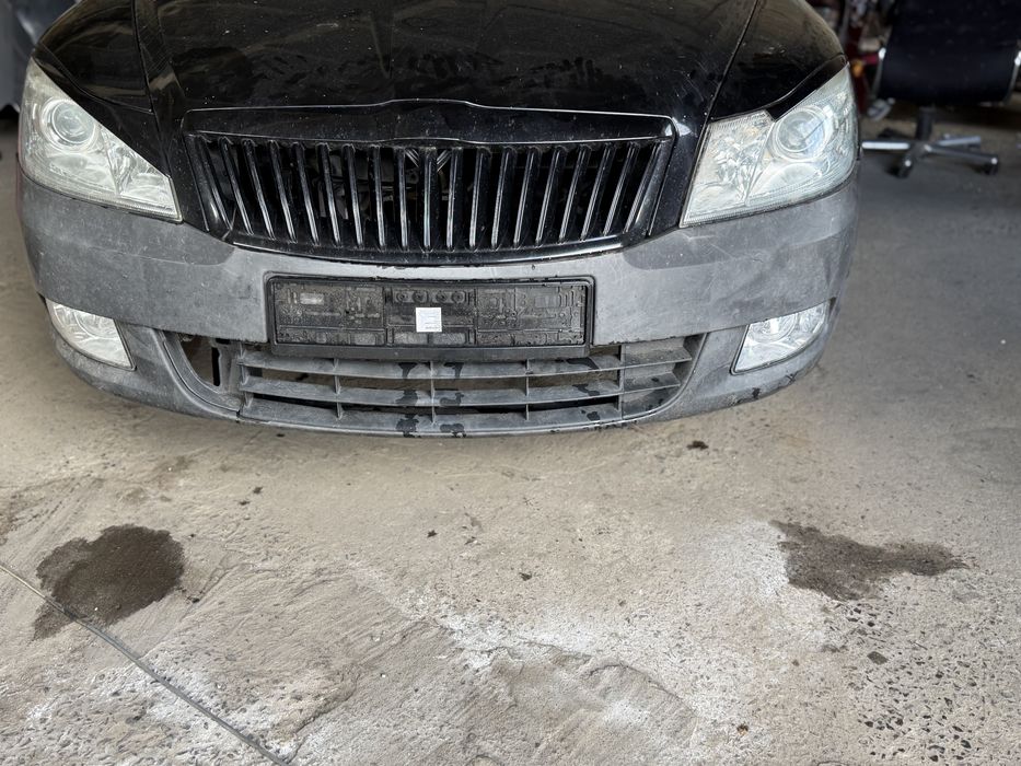 Передній бампер, протитуманні фари, решітка Škoda Octavia