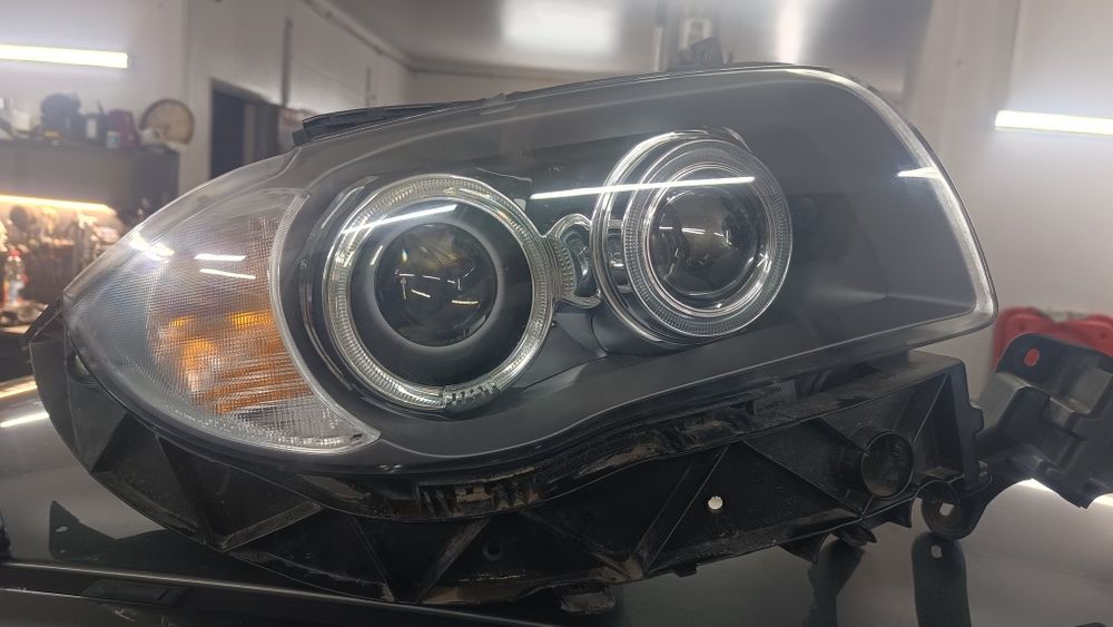 BMW e87 caly kpl przód lampy zderzak człowka ksenon