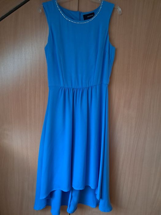 Suknia midi asymetryczna błękitna bez rękawów r.38-40"Reserved".