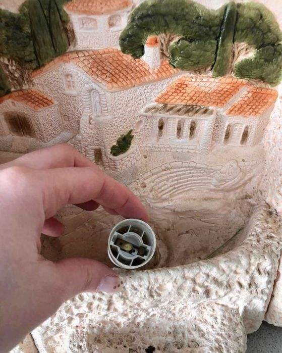 Relógio em pedra c/ luz de presença