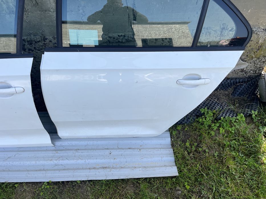 Двері шкода Рапід Skoda Rapid