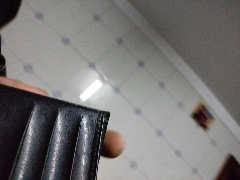 Carteiras de homem em pele genuína