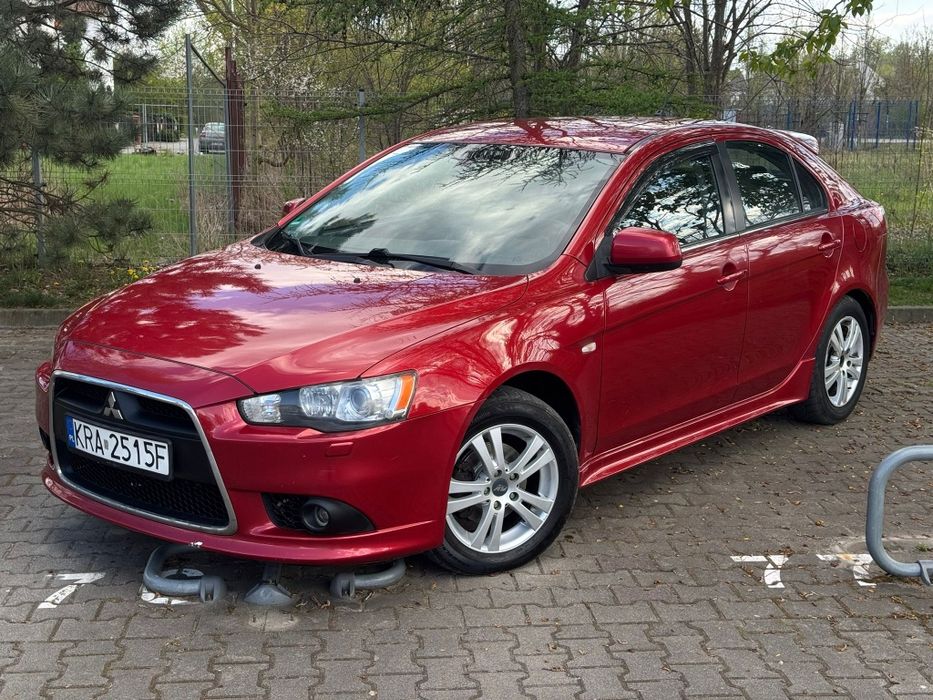 Mitsubishi Lancer 1.8 LPG 2010r. Automat/tempomat/klima/skóra/lopatki/radio NAVi/keyless GO
