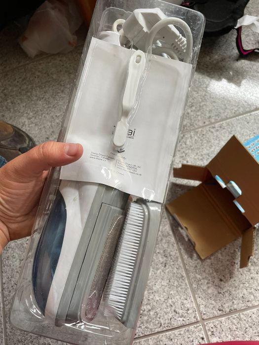 Escova e ferro a vapor elétrica