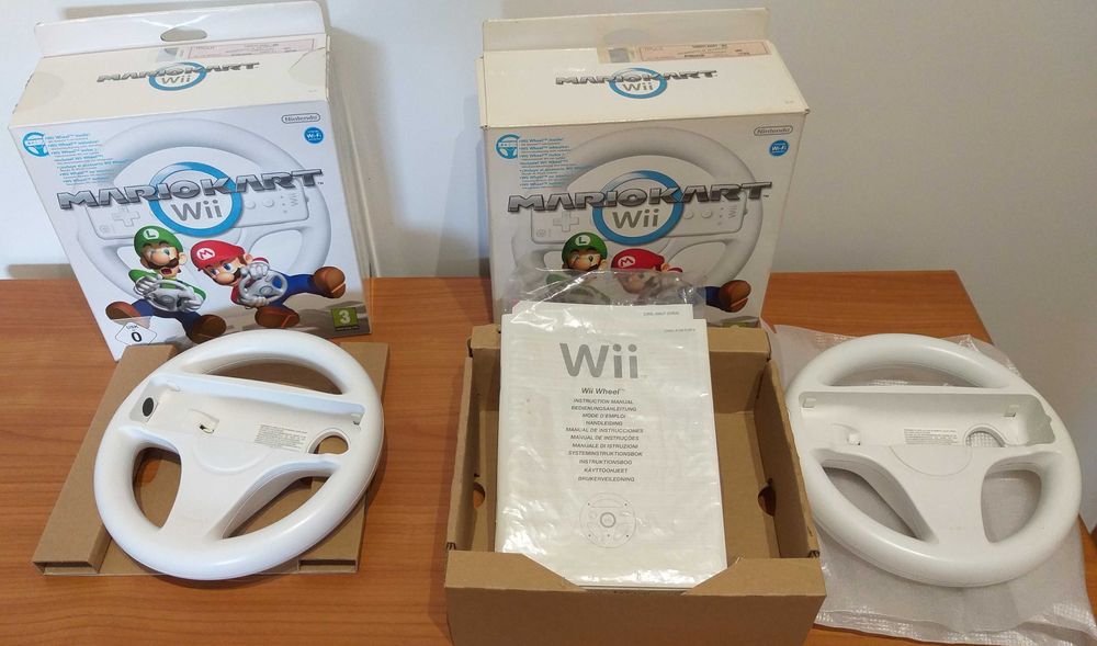 2 Caixas Mario Kart + Volante original - Manuais wiimote