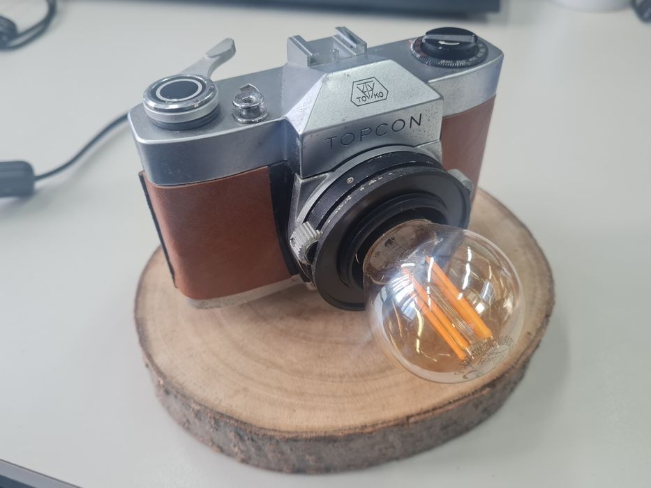 Candeeiro-máquina fotográfica