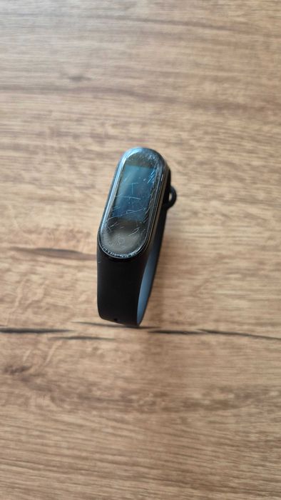 Mi band 4 używany z kablem do ładowania i nieoryginalnym paskiem