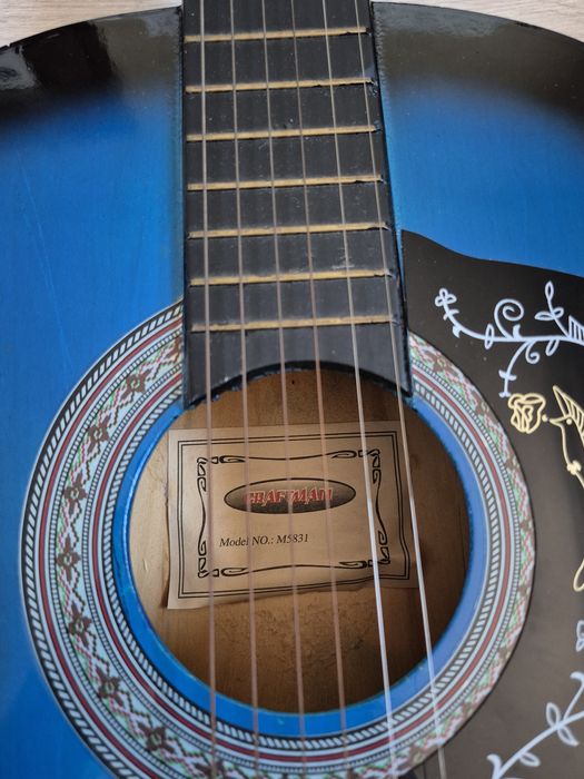 Niebieska gitara Craftman