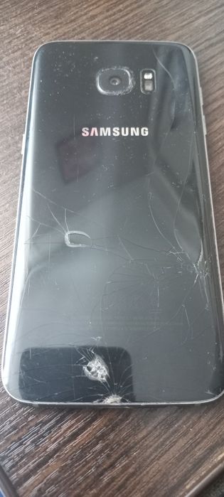 Телефон Samsung G935f