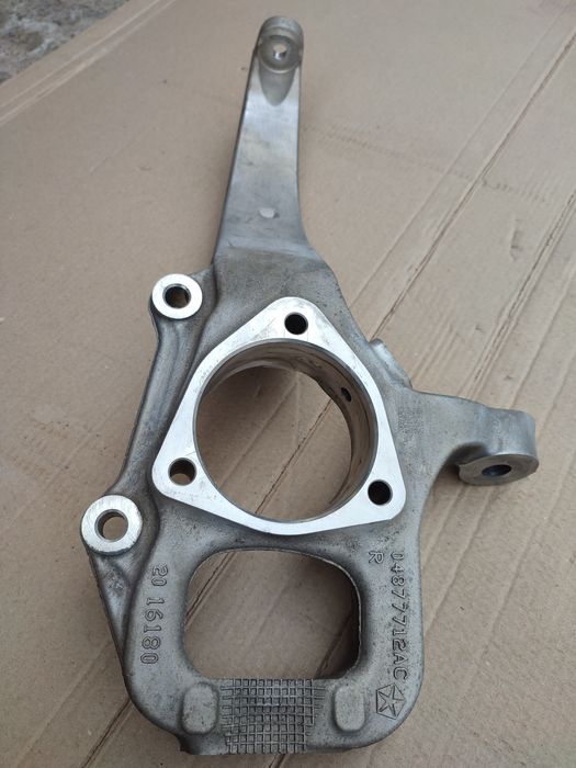 Поворотний кулак Jeep Grand Cherokee