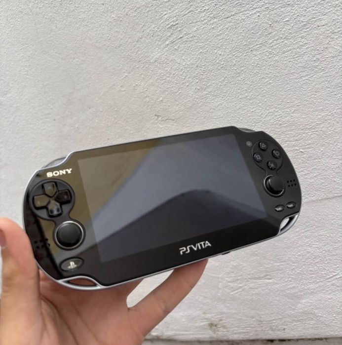 PSP Vita Oled + Travel Kit + jogos