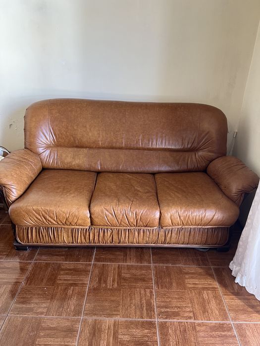 Sofa tres lugares com cama