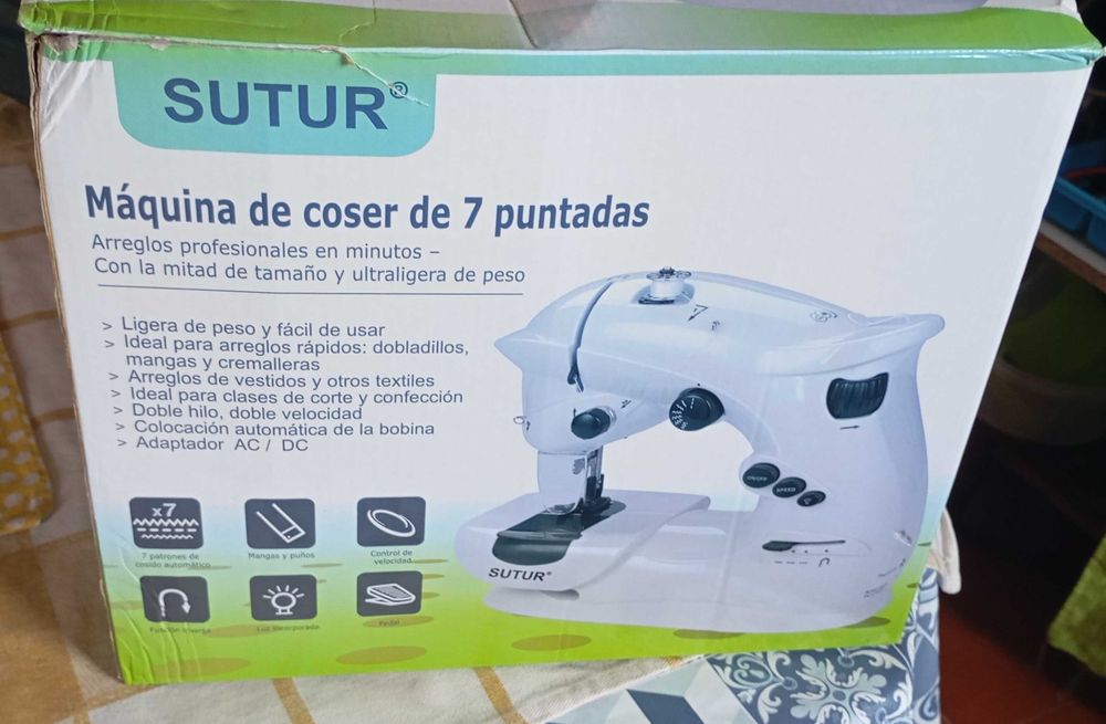 máquina de costura portátil