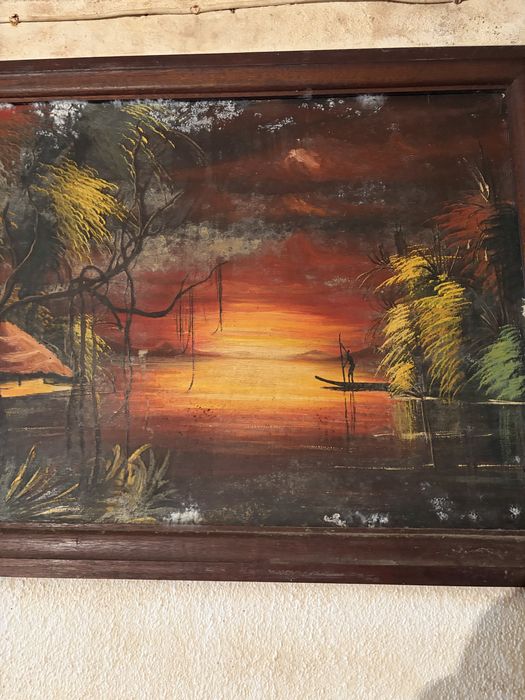 Quadro decorativo com uma pintura de uma paisagem tropical ao pôr do sol, semelhante a obras de arte de ilhas tropicais com palmeiras e barcos