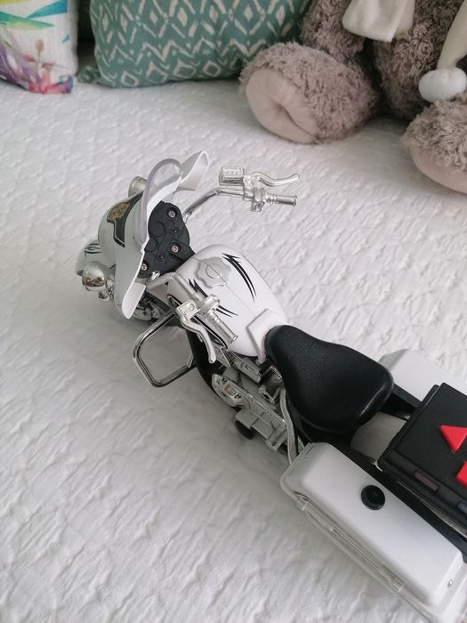 Brinquedo mota de polícia com som e luzes