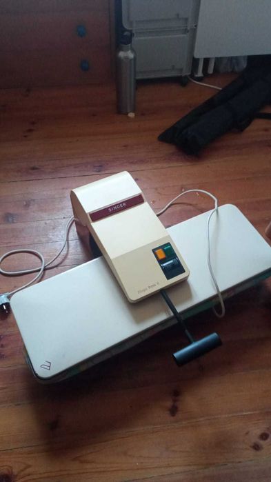 Prenso de engomar Singer