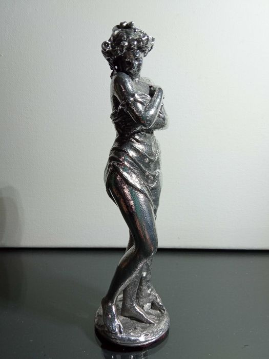 Estatueta figura em Metal polido
