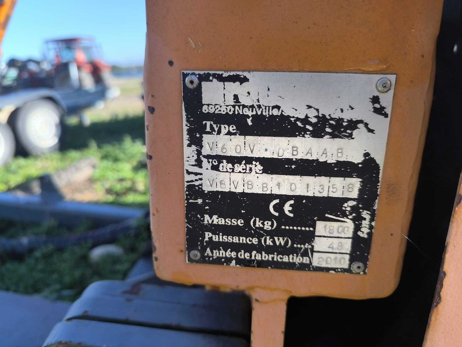 Trator de rodas Case IH JX 95 + Triturador Rousseau Velthéa