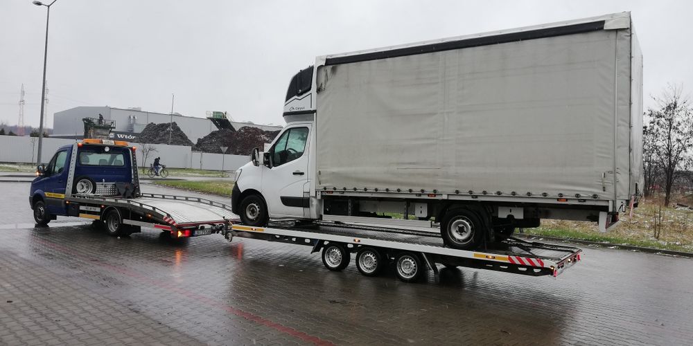 Przewóz Pojazdów Maszyn Autolaweta Laweta Pomoc Drogowa Polska UE