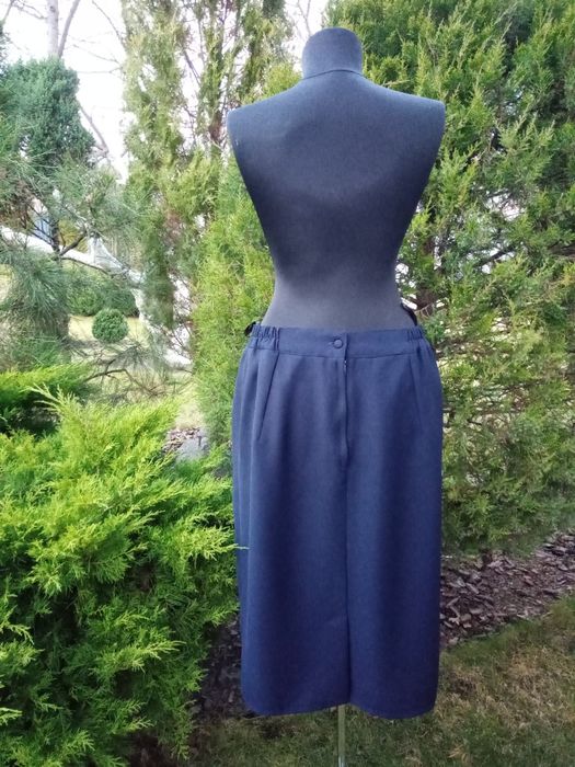 новый элегантный Польский костюм52-54р.