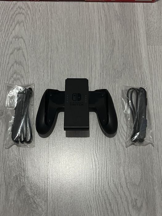 Zestaw Nintendo Switch + 2 gry + paletki