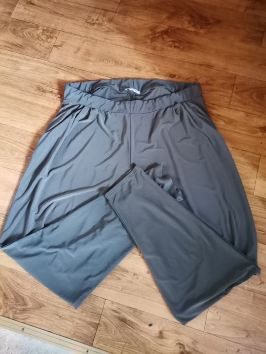 Spodnie damskie z kieszeniami lekkie przewiewne elastyczne rozmiar xl.