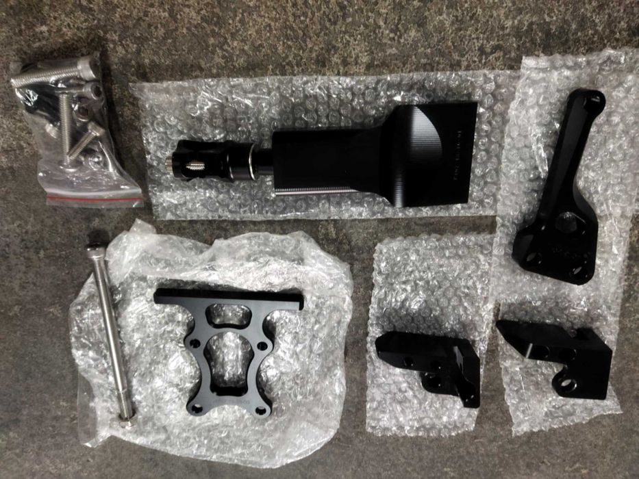 Suporte para amortecedor de direção para moto