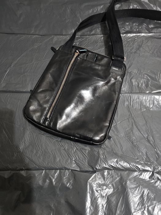 Шкіряна сумка Piquadro та Timberland