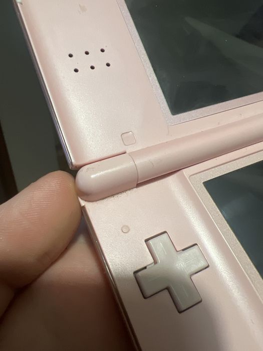 Nintendo DS Lite różowy + 9 gier ładowarka case