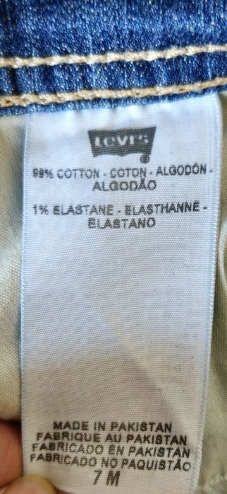 Levi's jeansy bootcut biodrówki przetarcia z USA