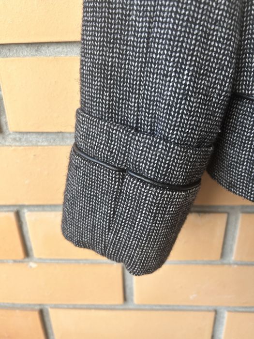 Casaco cintado em fazenda