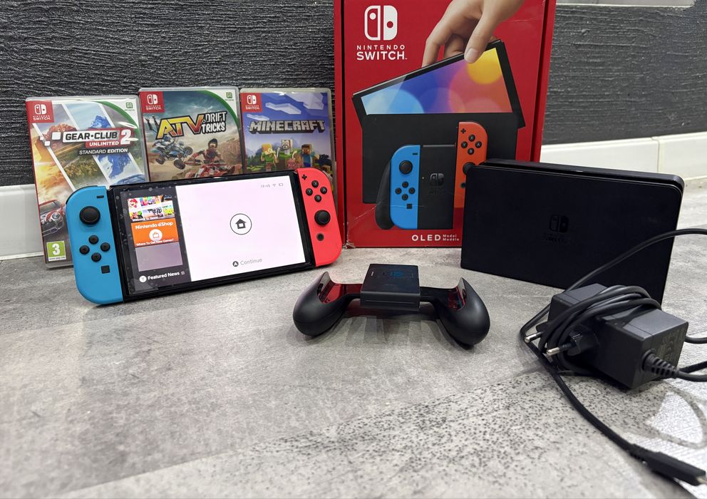 Nintendo Switch OLED + pad + 3 gry + przystawka TV kompletny jak nowy MINECRAFT