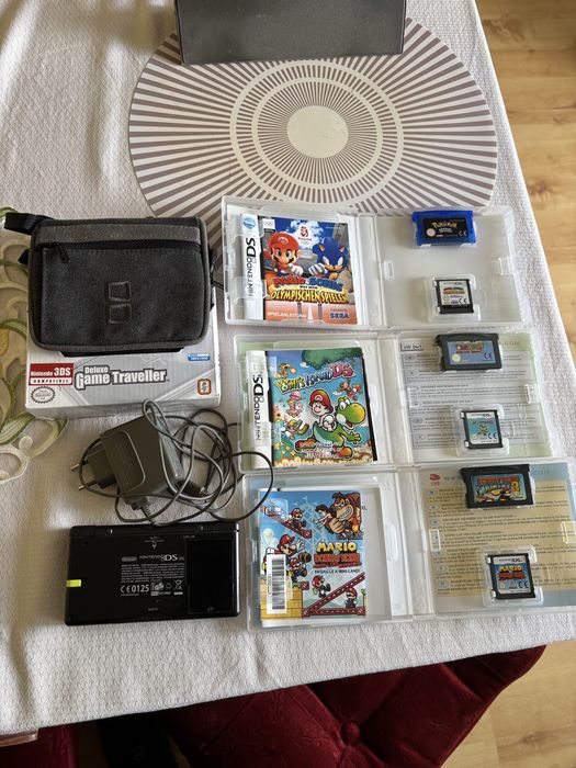 Nintendo DS Lite z szesc grami ( Super Mario, Donkey Kong, Yoshi, Pokemon)