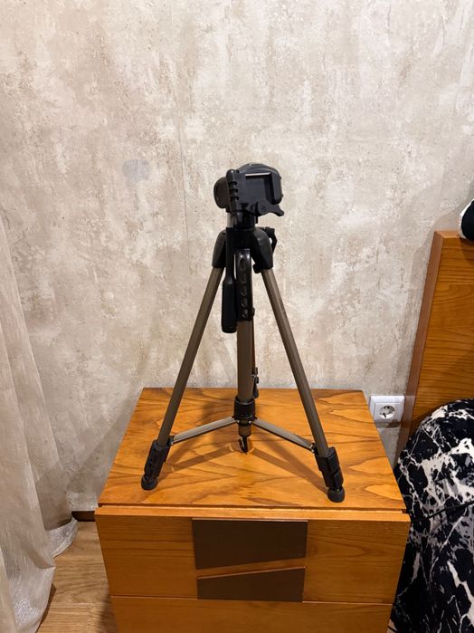 Tripé para câmara fotográfica
