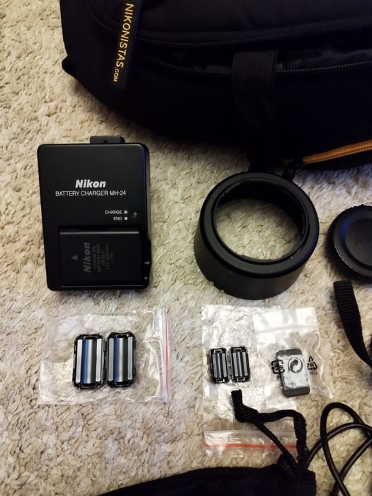 Nikon D3100 + lente extra