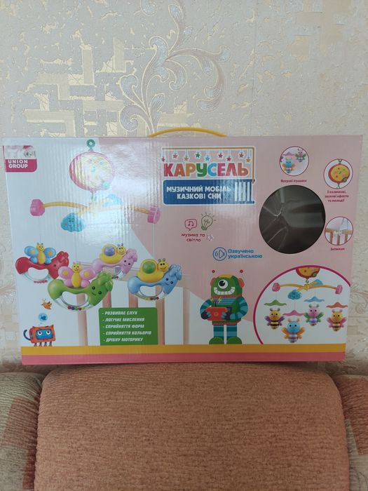 Дитячий музичний мобіль