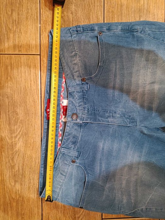 Spodnie 7/8 jeansy damskie niebieskie 44