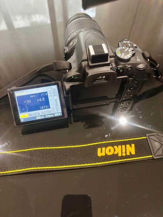 Nikon D5100 com duas lentes e acessórios pouco uso