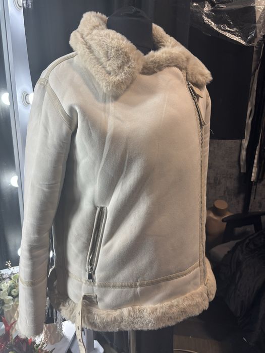 Дубленки теплі нові