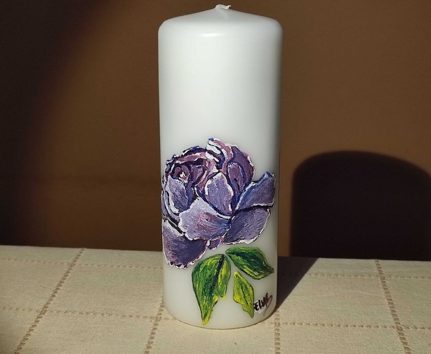 Vela com uma flor
