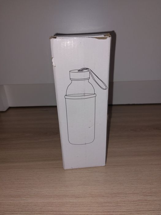 Nowa butelka bidon szklany w pokrowcu
