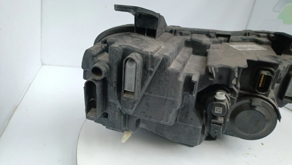 Ótica / farol esquerda DACIA Duster (HM_)