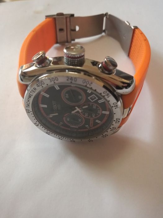 Zegarek marki Tissot srebrno pomarańczowy