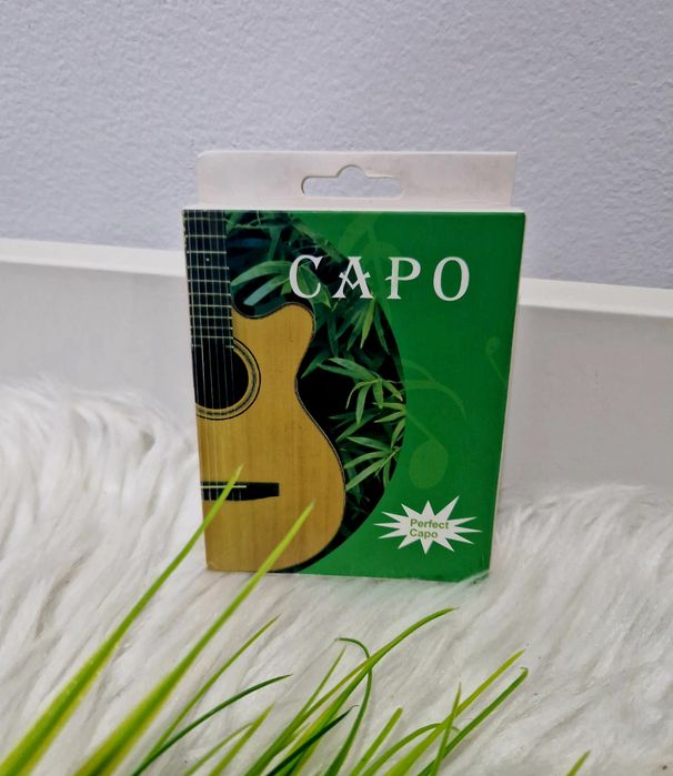 Capo guitarra novo