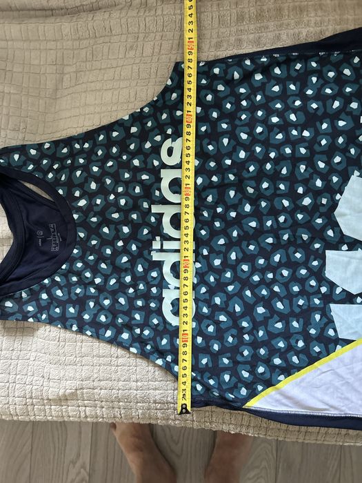 Продам фирмееная майка адидас привезена из за границы цвет синий матер