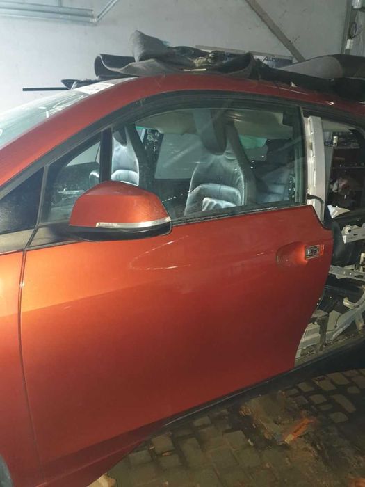 Двері передні ліві із зовнішньою рудою обшивкою BMW i3 51007369329