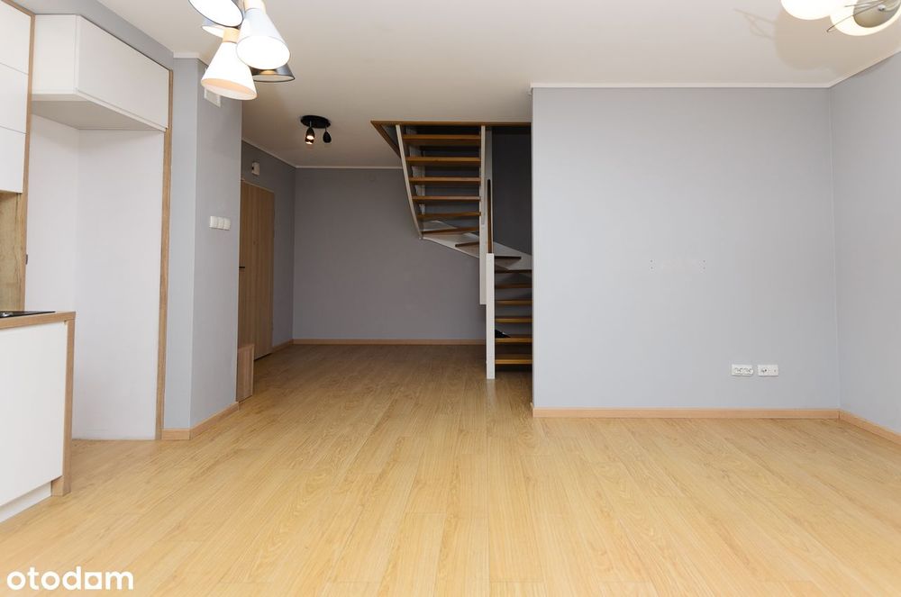 Przestronne dwupoziomowe mieszkanie z balkonem i windą - Więcej