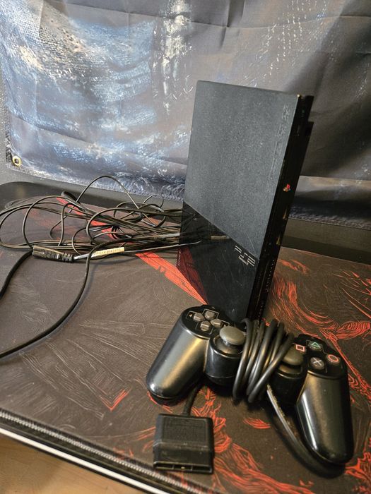PlayStation 2 Slim + Gry
