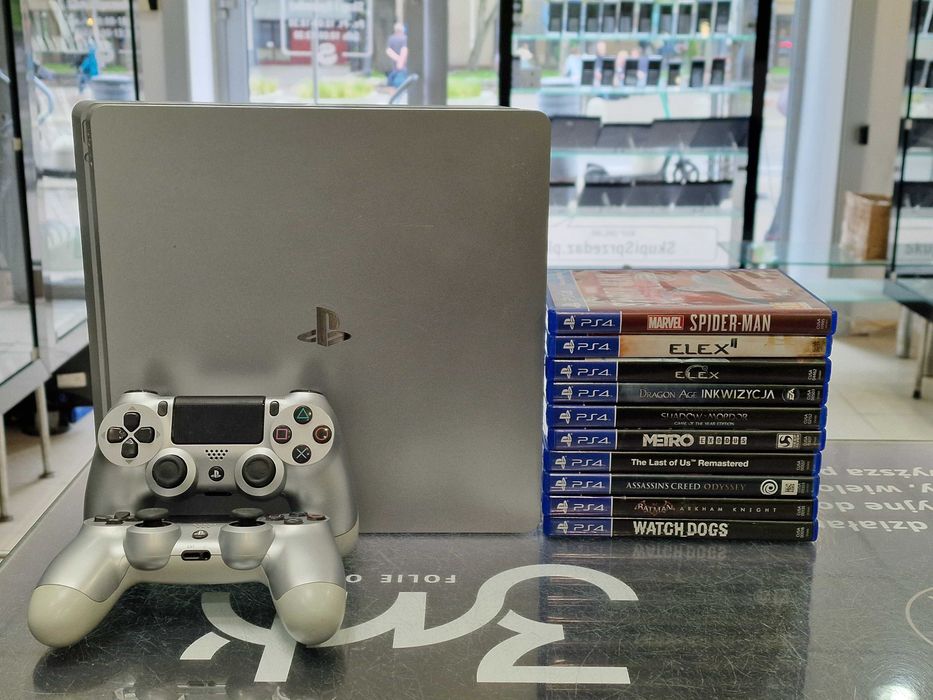 Playstation 4 Slim Silver 500GB/ 2 pady/ 10 gier/ Grade B/ GW 6msc/PS4